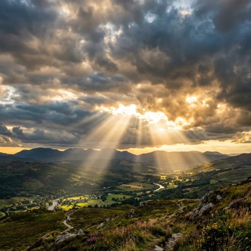 Sun rays coming down from heavy clouds